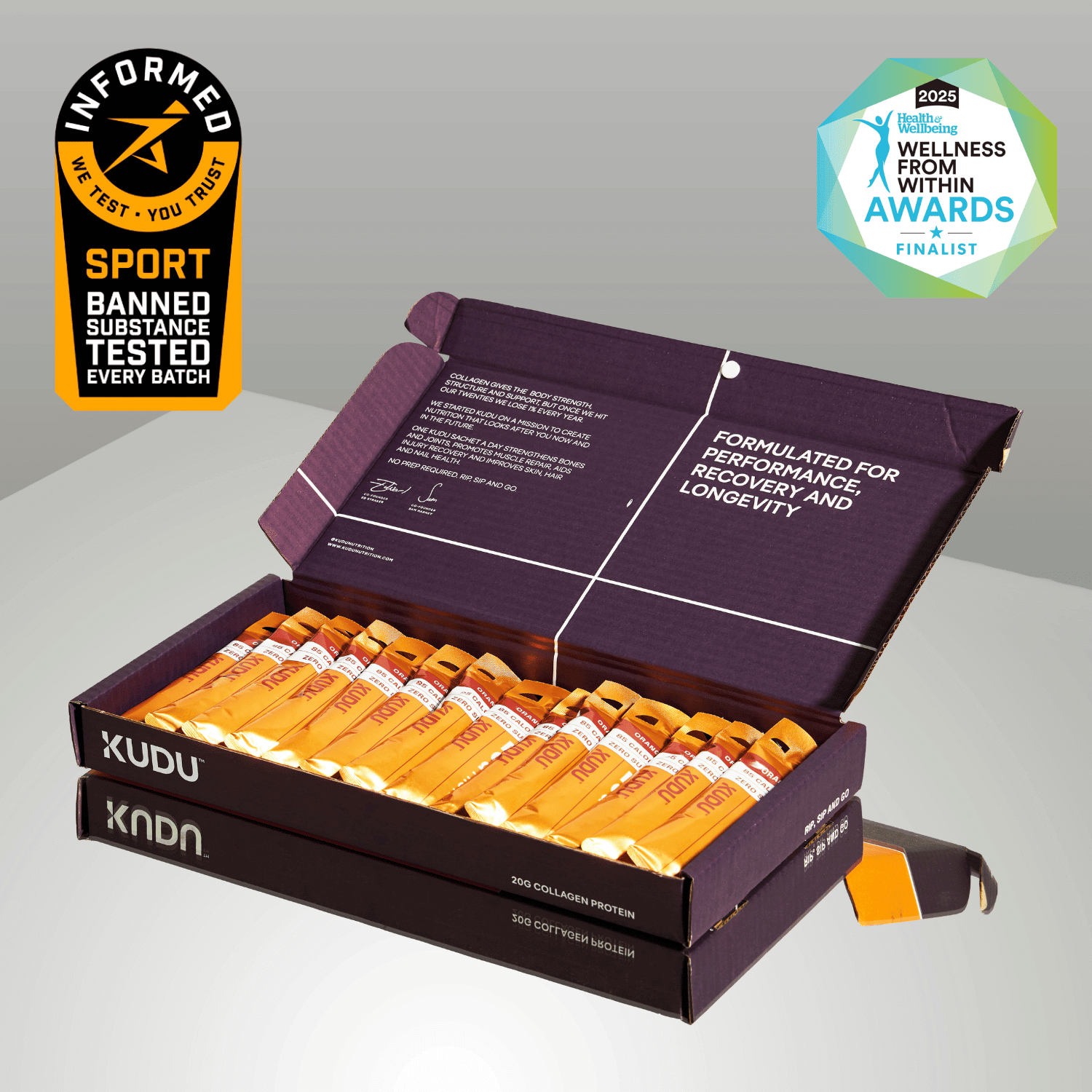 A box of KUDU brand orange-flavored liquid collagen protein supplements with individual sachets inside. The packaging is predominantly purple and orange, with product information and branding displayed.