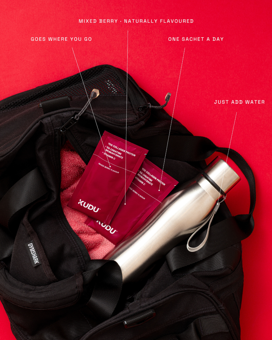 KUDU mixed berry Collagen + Creatine sachets in a gym bag — one sachet a day, just add water